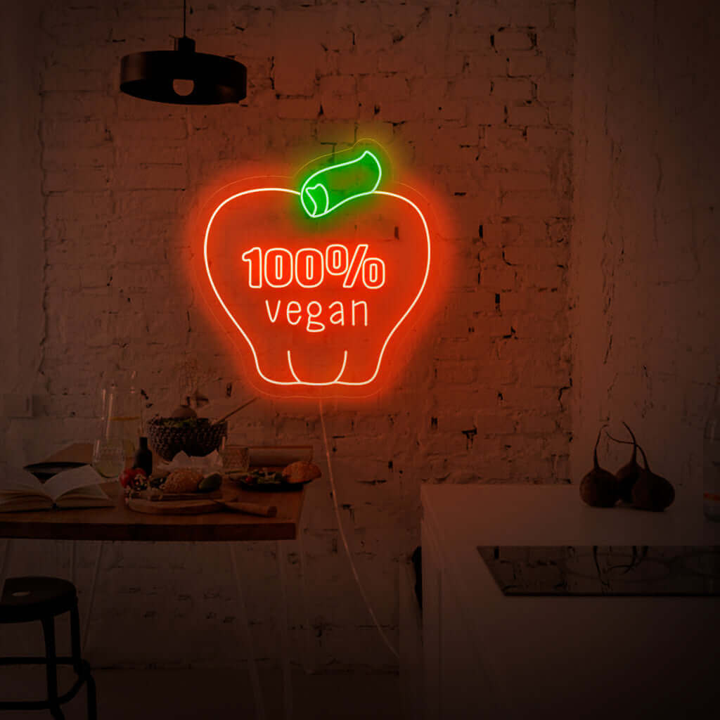 „100 % vegan mit Apfel-Neonschild“ zeichnet sich durch ein lebendiges und umweltfreundliches Design aus und präsentiert stolz das Apfelsymbol als Beweis für Ihr Engagement für einen pflanzlichen Lebensstil.