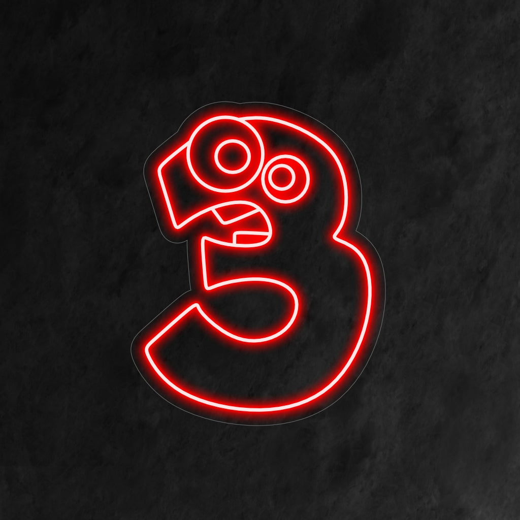 „3rd Birthday Neon Sign“ zeigt eine süße und komische Zahl 3 mit karikaturhaften Augen und Zähnen, die der Feier zum dritten Geburtstag eines Kindes eine entzückende Note verleiht.