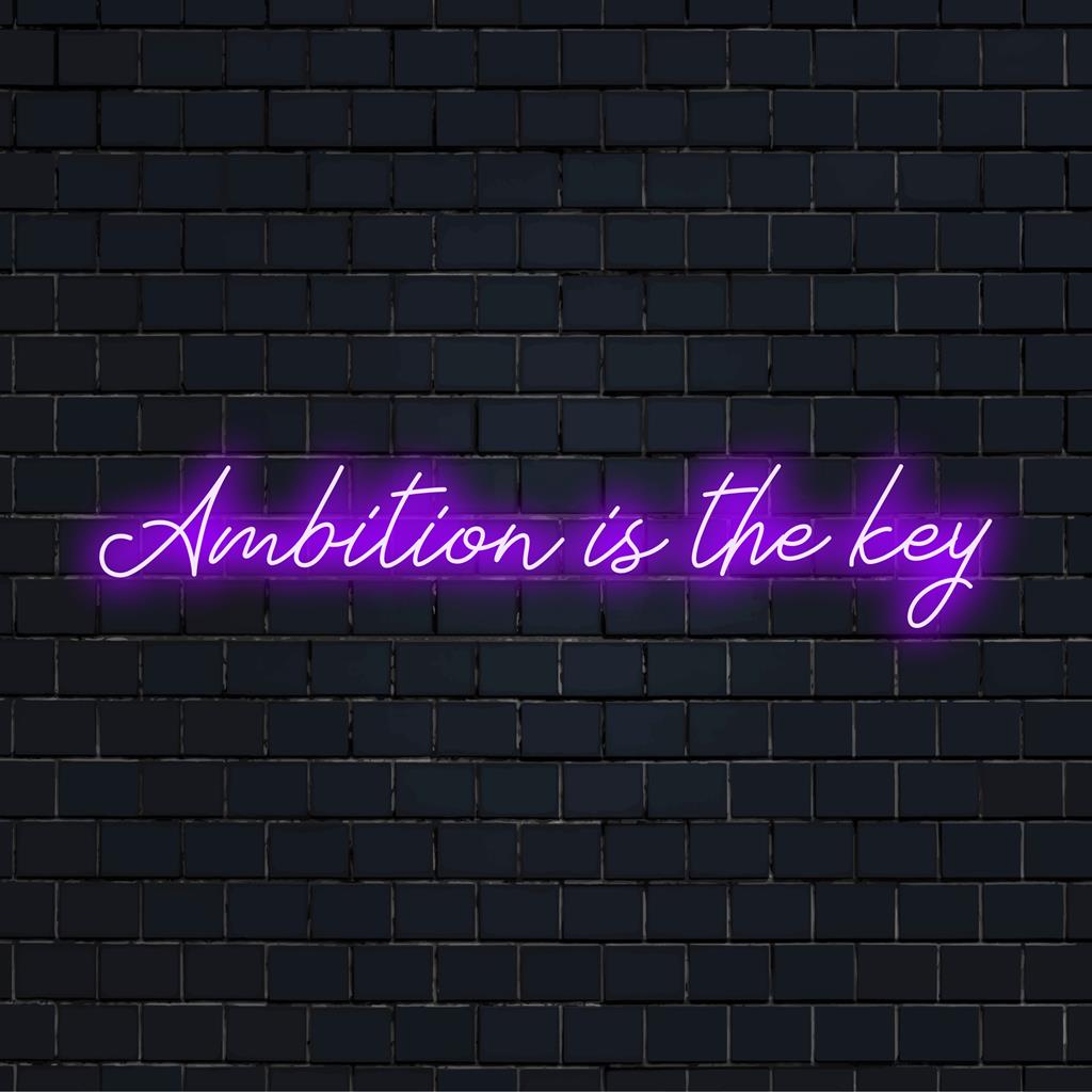 Maßgefertigtes LED-Neonschild mit der Aufschrift „Ambition Is The Key“ in leuchtenden Farben, perfekt für eine individuelle Einrichtung.