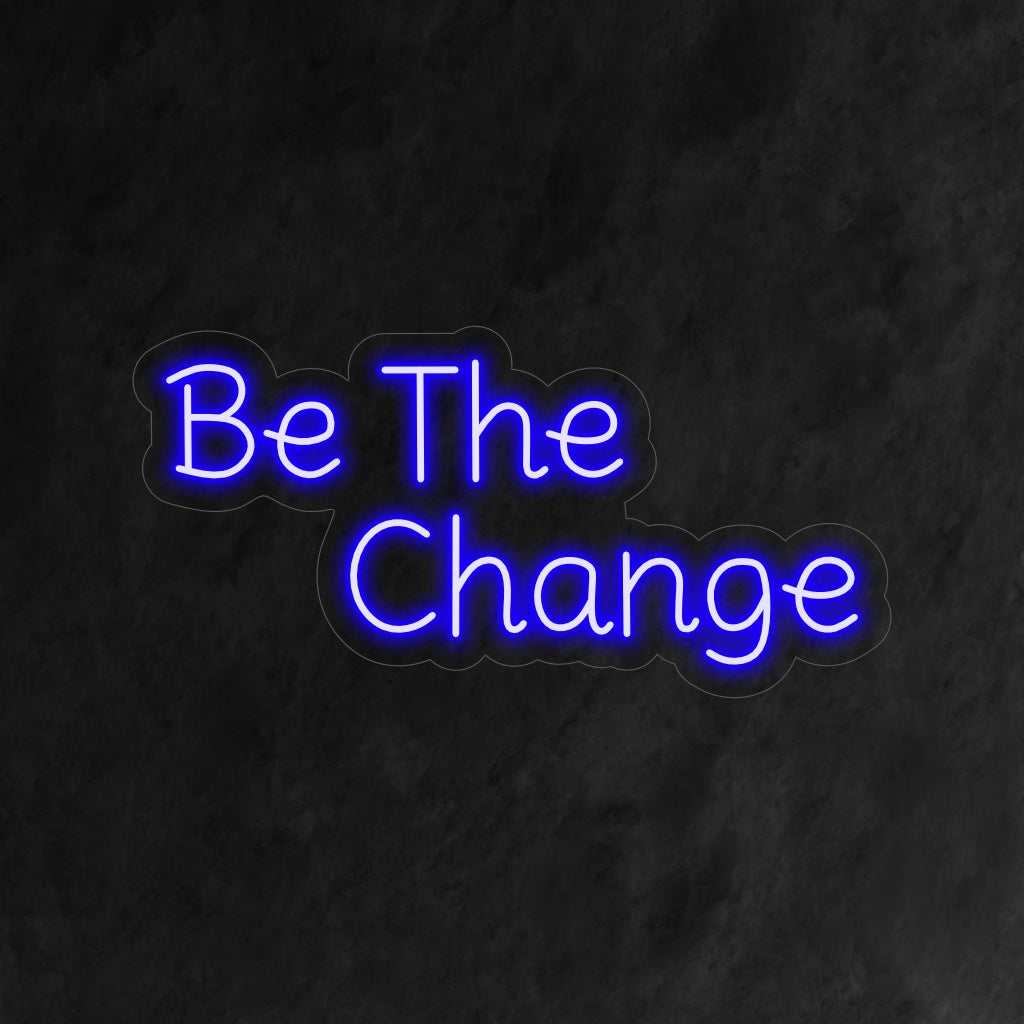 „Be the Change Neon Sign“ – Ein kraftvolles Neonlicht mit einer inspirierenden Botschaft, das Ihrem Wohnraum Positivität und Ermächtigung verleiht.