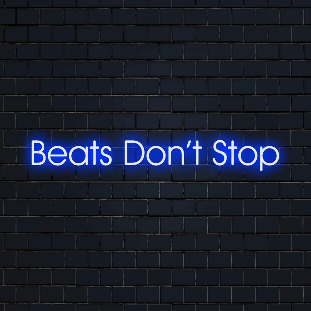 Individuelles LED-Neonschild mit dem Satz „Beats Don't Stop“, das lebendige Neonkunst für Dekoration und Atmosphäre präsentiert.