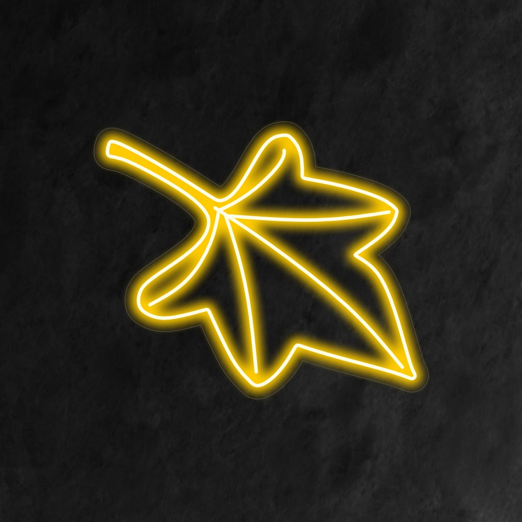 „Fall Leaf Neon Sign“ leuchtet in warmen Herbsttönen, perfekt für saisonale Dekoration und Räume, die die Schönheit des Herbstes feiern.