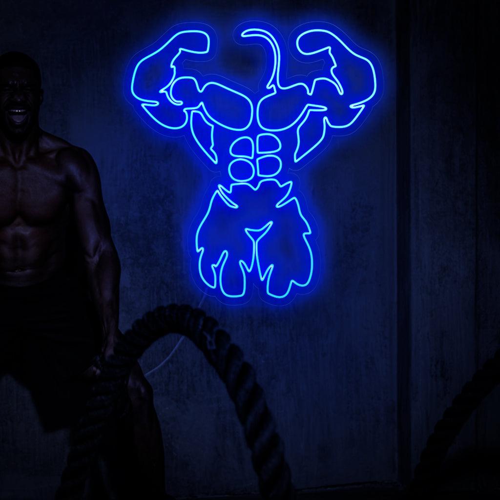 „Fitness Bodybuilder Neon Sign“ leuchtet kraftvoll, perfekt für Fitnesscenter und Räume, in denen das Engagement für einen gesunden Lebensstil gefeiert wird, und verleiht der Atmosphäre eine dynamische Note.