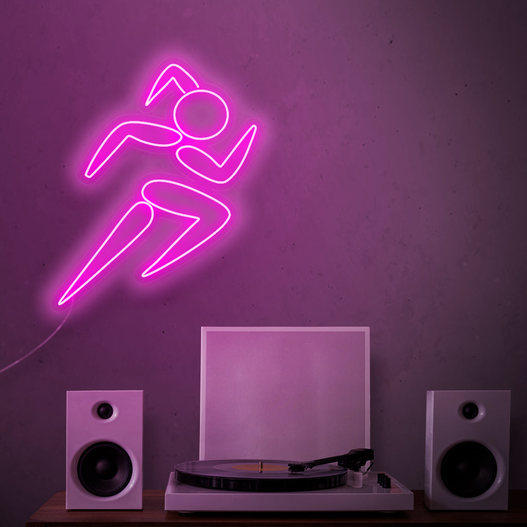 „Girl Running Neon Sign“ – Fängt die dynamische Energie einer Läuferin ein, perfekt für Fitnessräume und Fitnessstudios, und inspiriert zu einem aktiven und gesunden Lebensstil.
