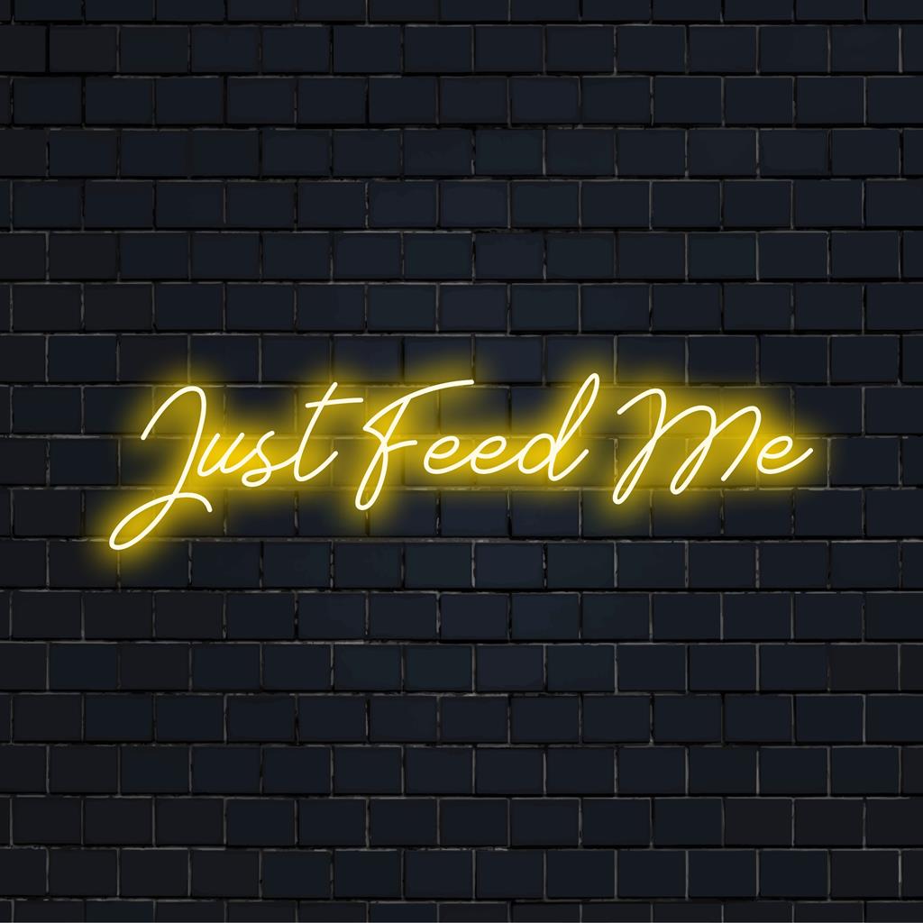 Leuchtendes LED-Neonkunstwerk mit der Aufschrift „Just Feed Me“, perfekt zum Beleuchten jedes Raums mit kräftigem, individuellem Neonstil.