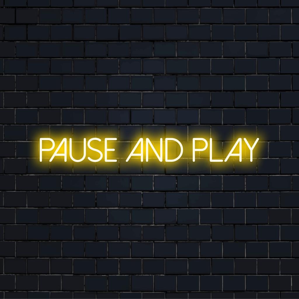 Individuelle LED-Neon-Wandkunst mit der Aufschrift „Pause und Play“, perfekt für die Schaffung eines lebendigen und persönlichen Raums.