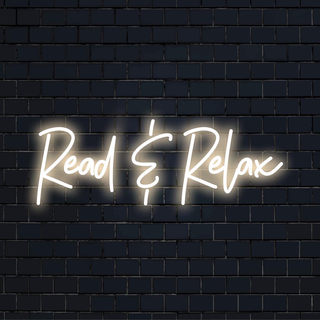 LED-Neonschild mit der Aufschrift „Read Relax“, das sanftes Leuchten und modernes Design kombiniert, um jeden Raum mit stimmungsvollem Licht und stilvollem Dekor aufzuwerten.
