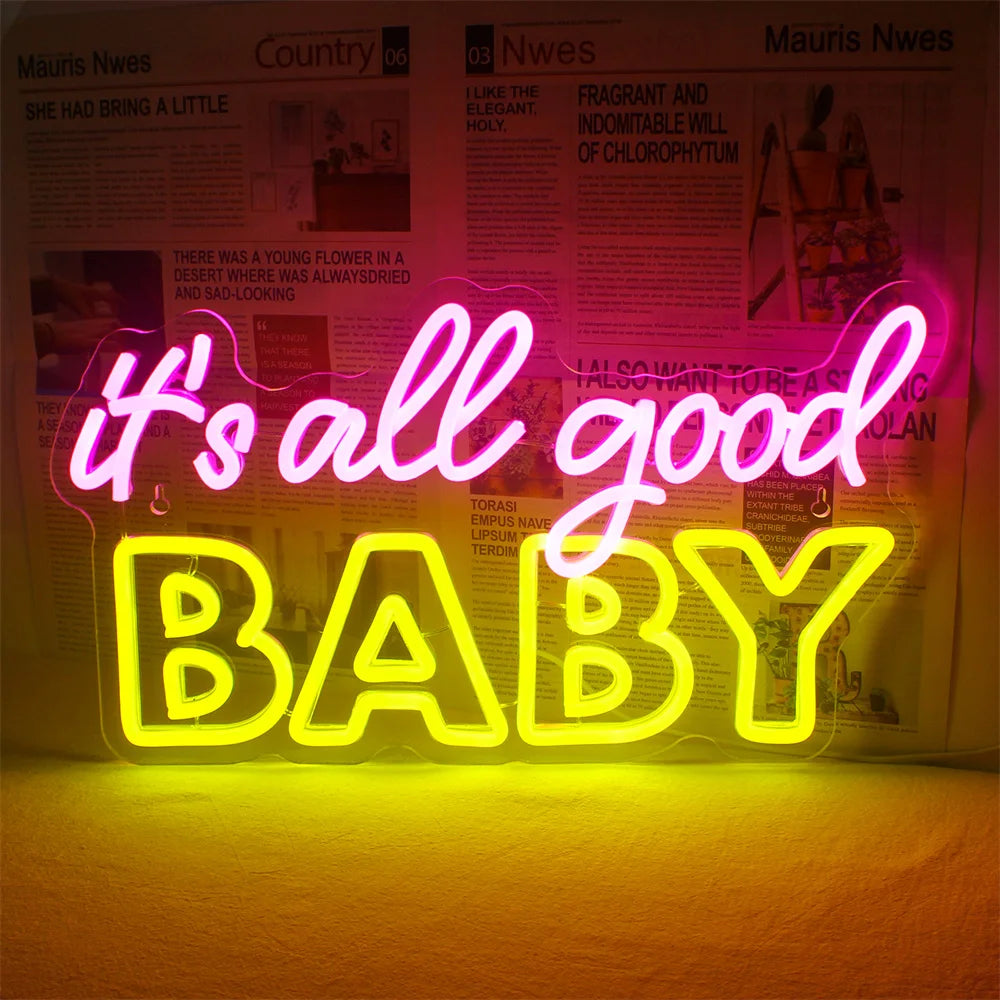 Das Bild zeigt ein leuchtendes LED-Neonschild mit der Aufschrift „It’s All Good Baby“, das in einer eleganten, modernen Schreibschrift gestaltet ist.
