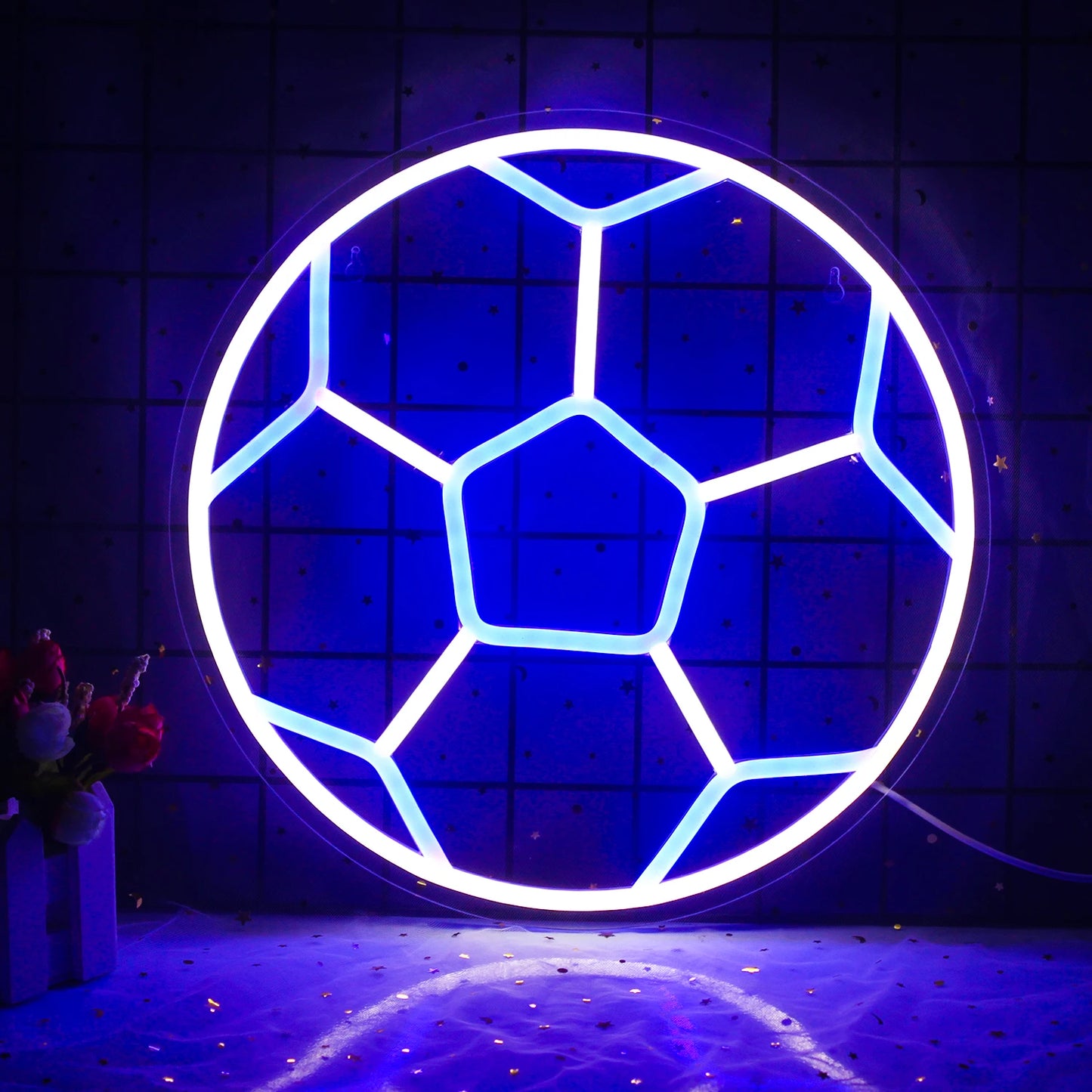 Ein lebendiges Fußball-LED-Neonschild mit dem leuchtenden Design eines Fußballs.