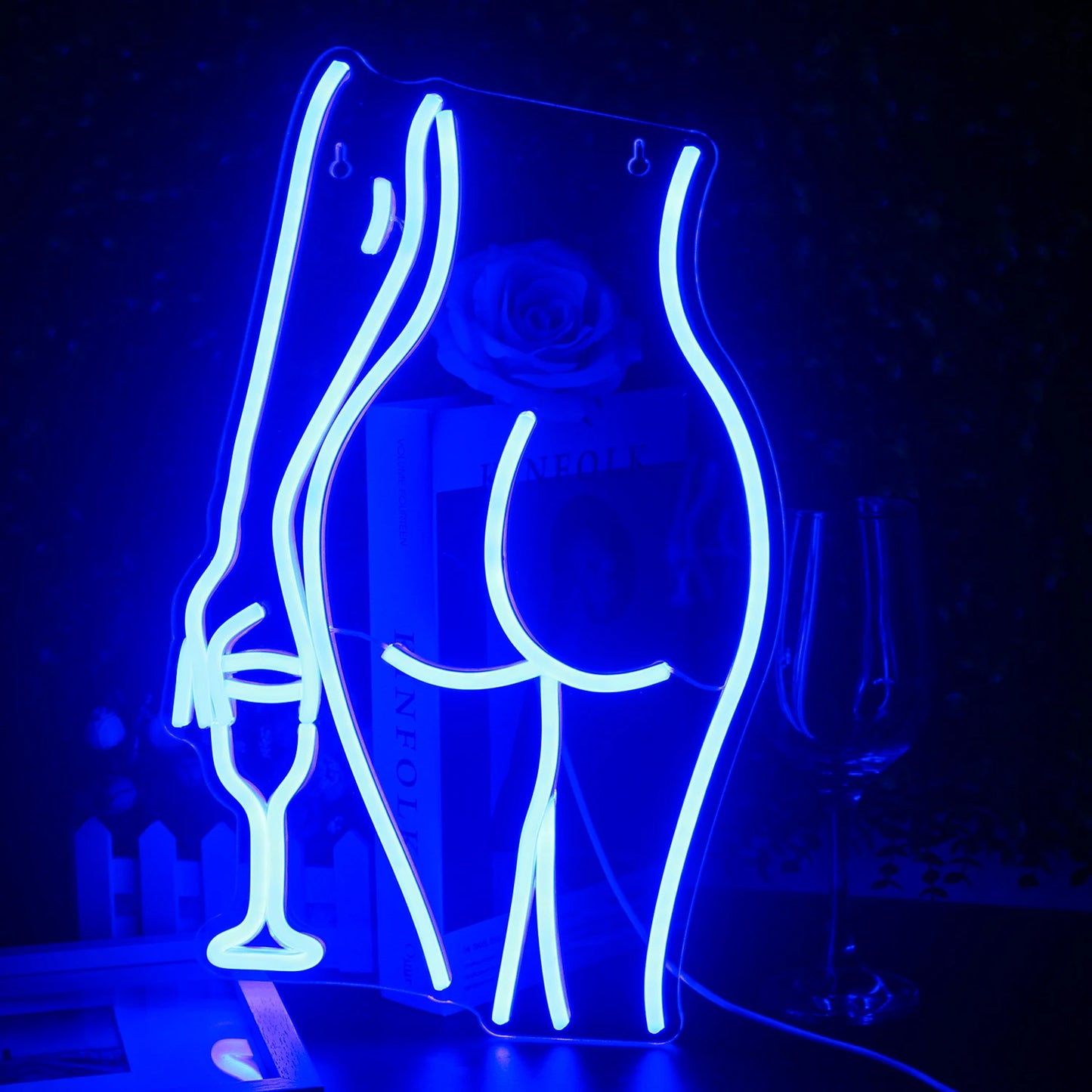 „Ein lebendiges, handgefertigtes LED-Neonschild in Form der Silhouette einer liegenden Frau.