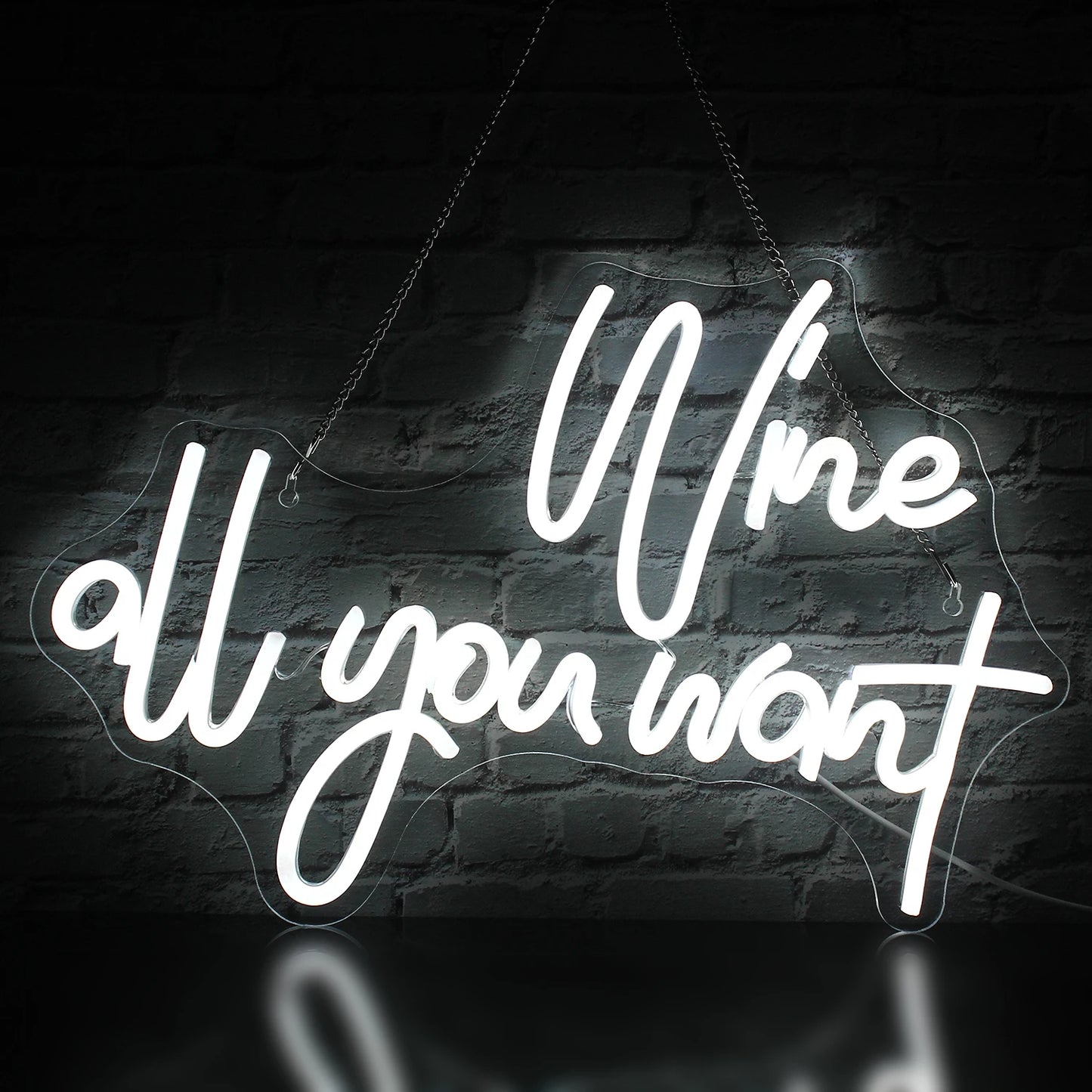 Das Bild zeigt ein leuchtendes LED-Neonschild mit der Aufschrift „Wine all you want“ in eleganter Schreibschrift.