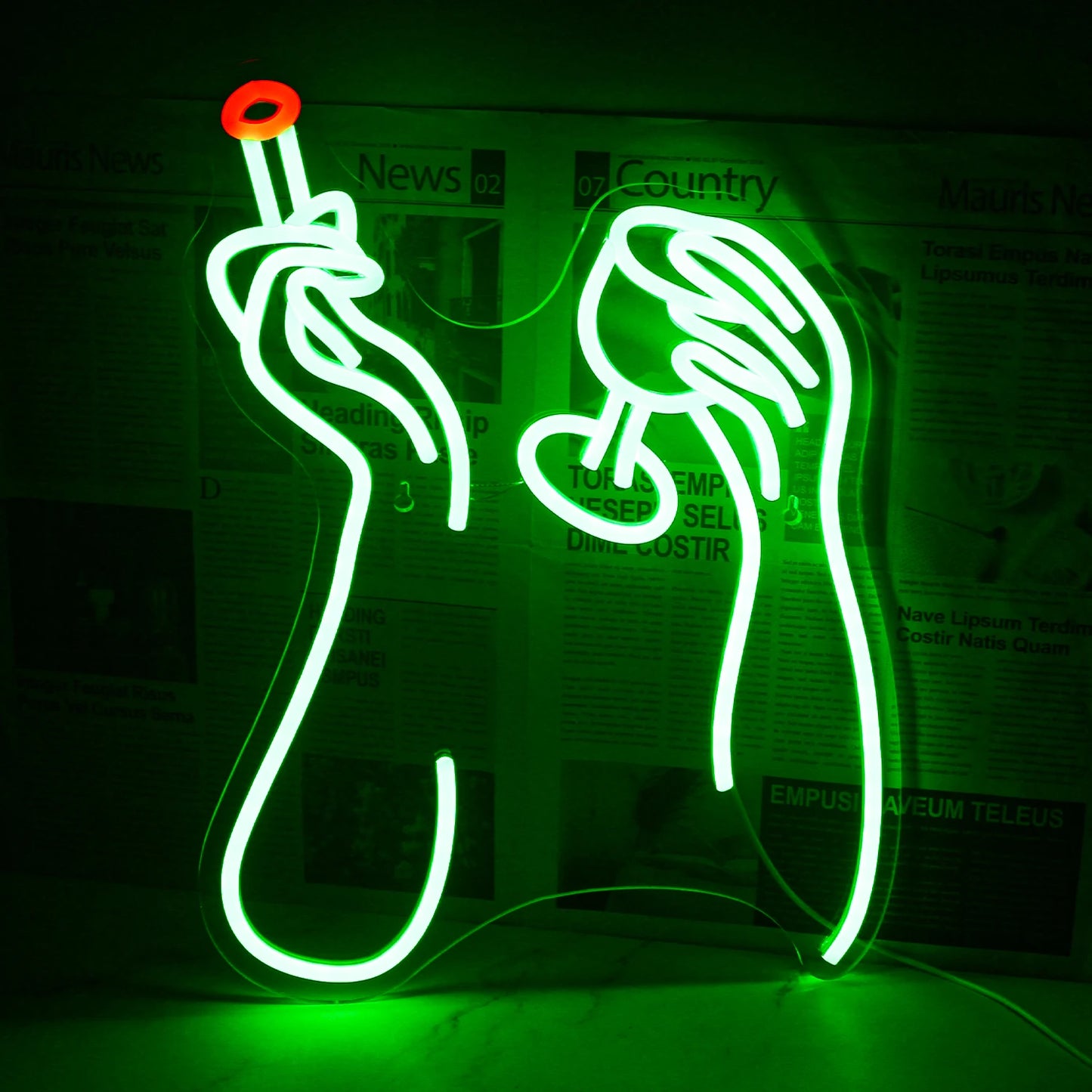 Das Bild zeigt ein leuchtendes LED-Neonschild mit den Worten „Rauchen und Trinken“ in hellen, auffälligen Farben.