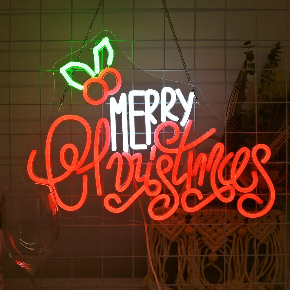 Das Bild zeigt ein lebendiges und festliches LED-Neonschild mit der Aufschrift „Frohe Weihnachten“.