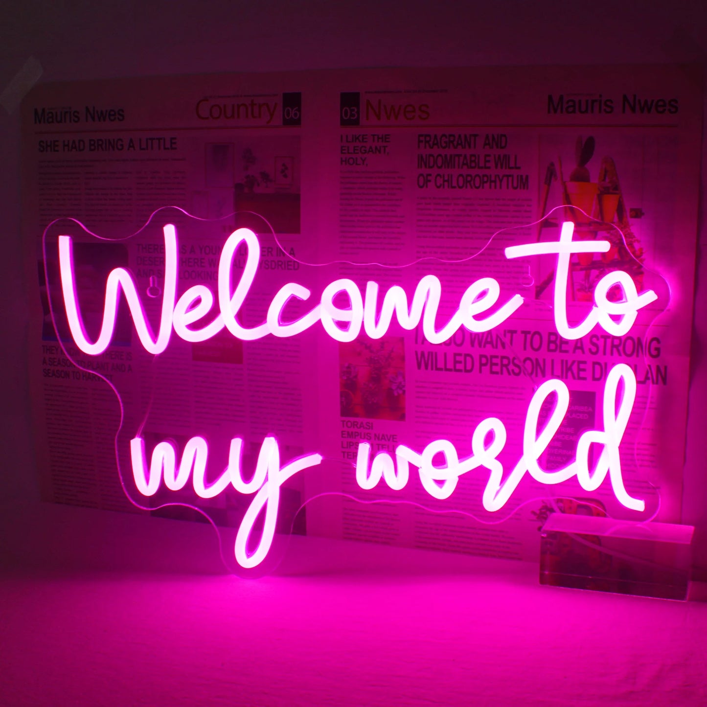 „Bild eines lebendigen LED-Neonschilds in einer stilvollen Schreibschrift, das in einem hellen und fröhlichen Farbton leuchtet.