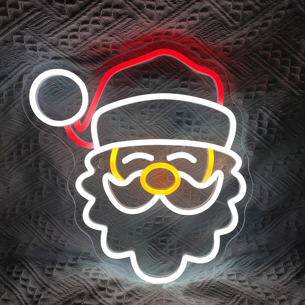 Das Bild zeigt ein helles und festliches LED-Neonschild mit der Aufschrift „Frohe Weihnachten“.