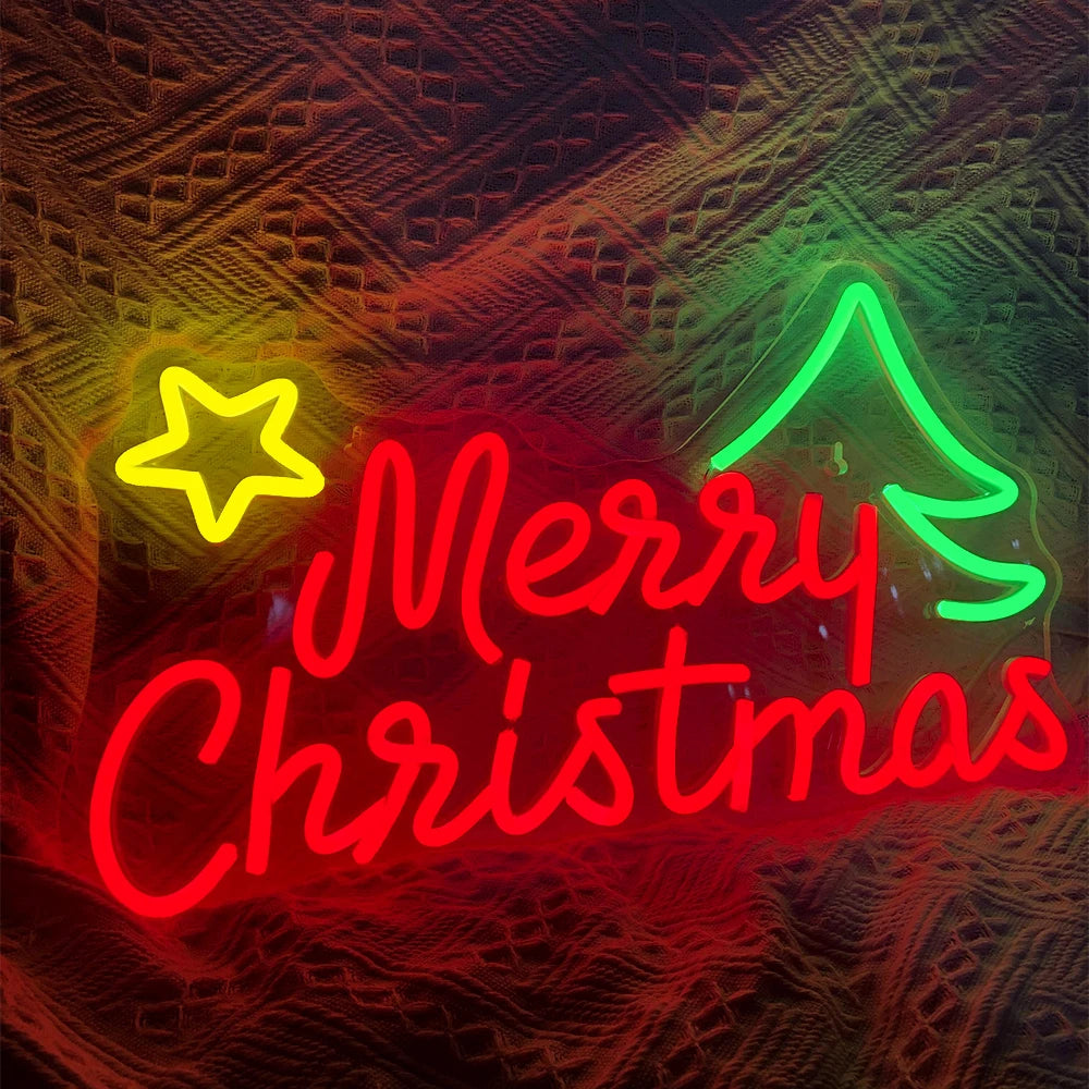 Das Bild zeigt ein leuchtendes LED-Neonschild mit der Aufschrift „Frohe Weihnachten“.