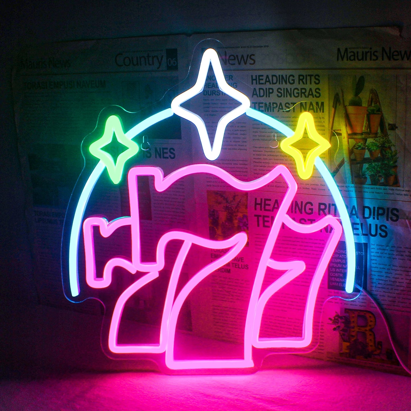 Das Bild zeigt ein lebendiges und auffälliges LED-Neonschild mit dem Wort „Luck“ in einer stilisierten Schreibschrift.