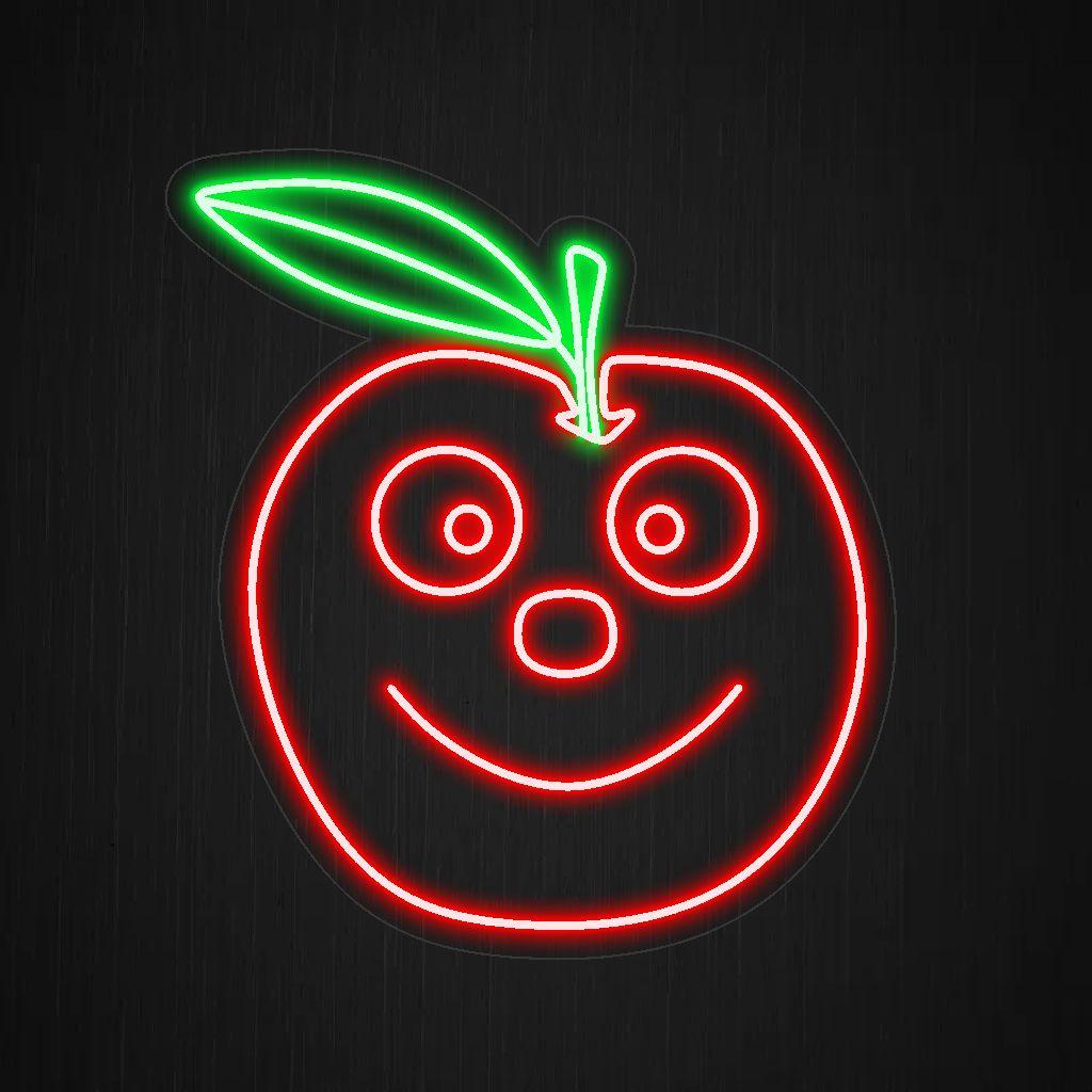 Ein beleuchtetes Neonschild mit einem lächelnden Apfel, das Freude ausstrahlt und jedem Raum einen Hauch fruchtiger Freude verleiht