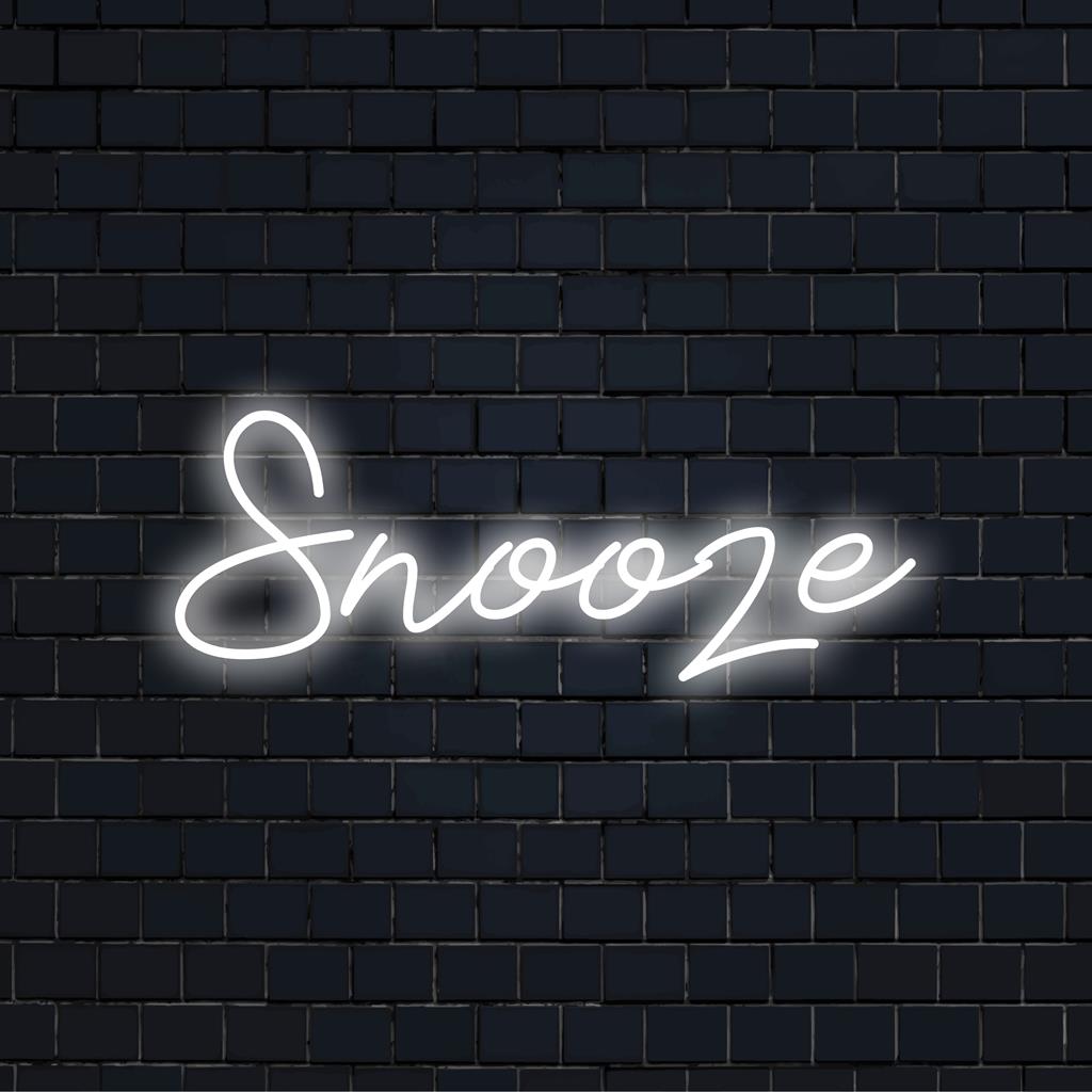 Ein lebendiges Snooze-LED-Neonschild, das perfekt in jeden Raum passt und Neonkunst und individuelle Eleganz zu einem einzigartigen Dekor vereint.