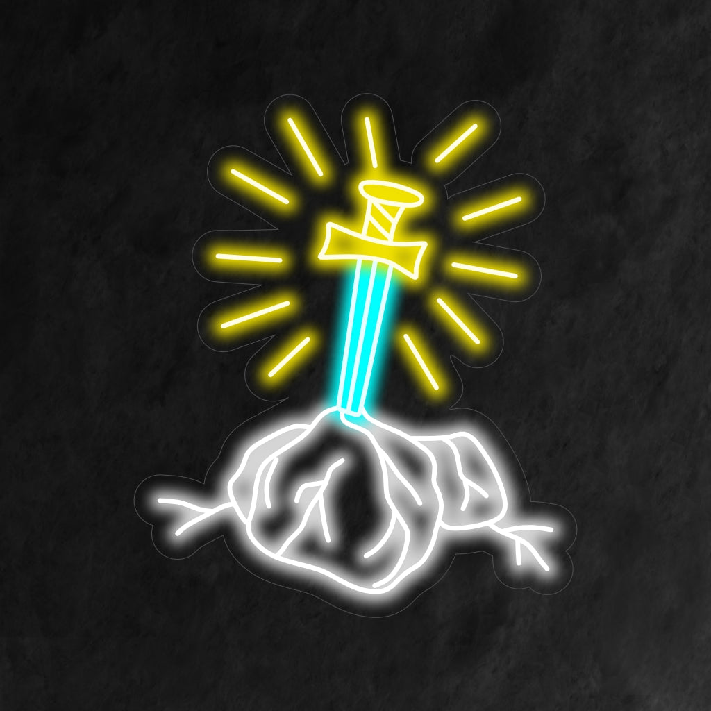 „Sword in the Stone Neon Sign“ ist eine mythische und bezaubernde Ergänzung für Ihr Fantasy-Interieur. Ein Neonlicht, das die legendäre Bildsprache eines Schwertes im Stein einfängt.