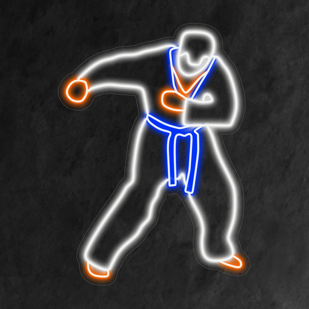 „Taekwondo Neon Sign“ verkörpert mit seinem kraftvollen Leuchten die Dynamik der Kampfkunst und zelebriert Disziplin und Stärke.