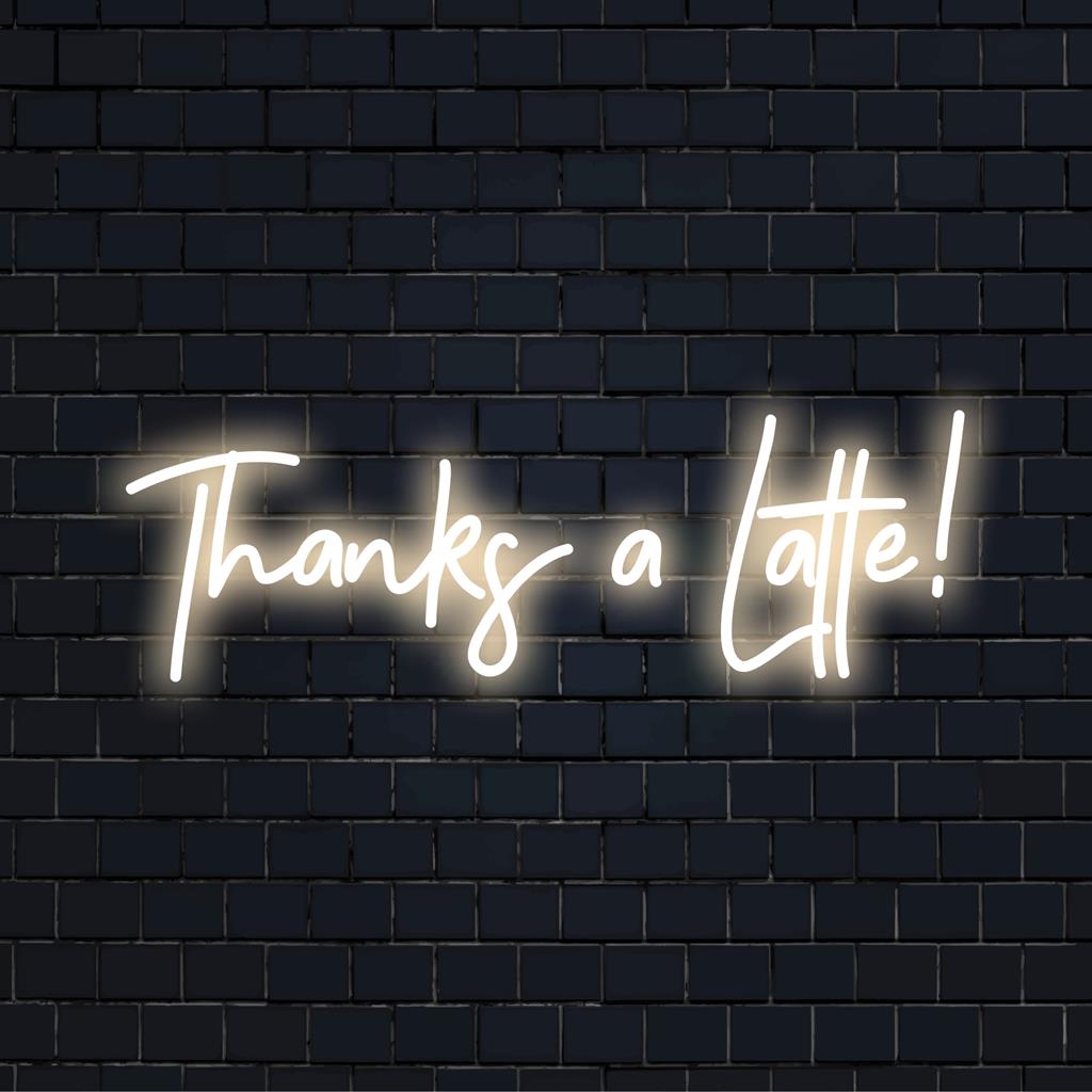 Lebendiges LED-Neonschild „Thanks A Latte!“ mit verspielter Schreibschrift, ein perfekter Coffeeshop-Charme oder ein ausgefallenes Dekorationsstück.