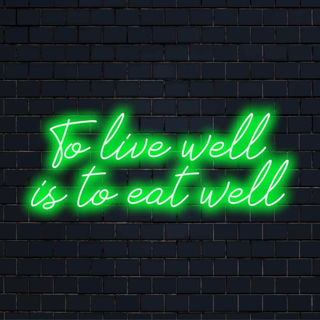 Lebendiges, individuelles LED-Neonschild „To Live Well Is To Eat Well“, perfekt zum Beleuchten von Räumen mit stilvoller Neon-Ästhetik.