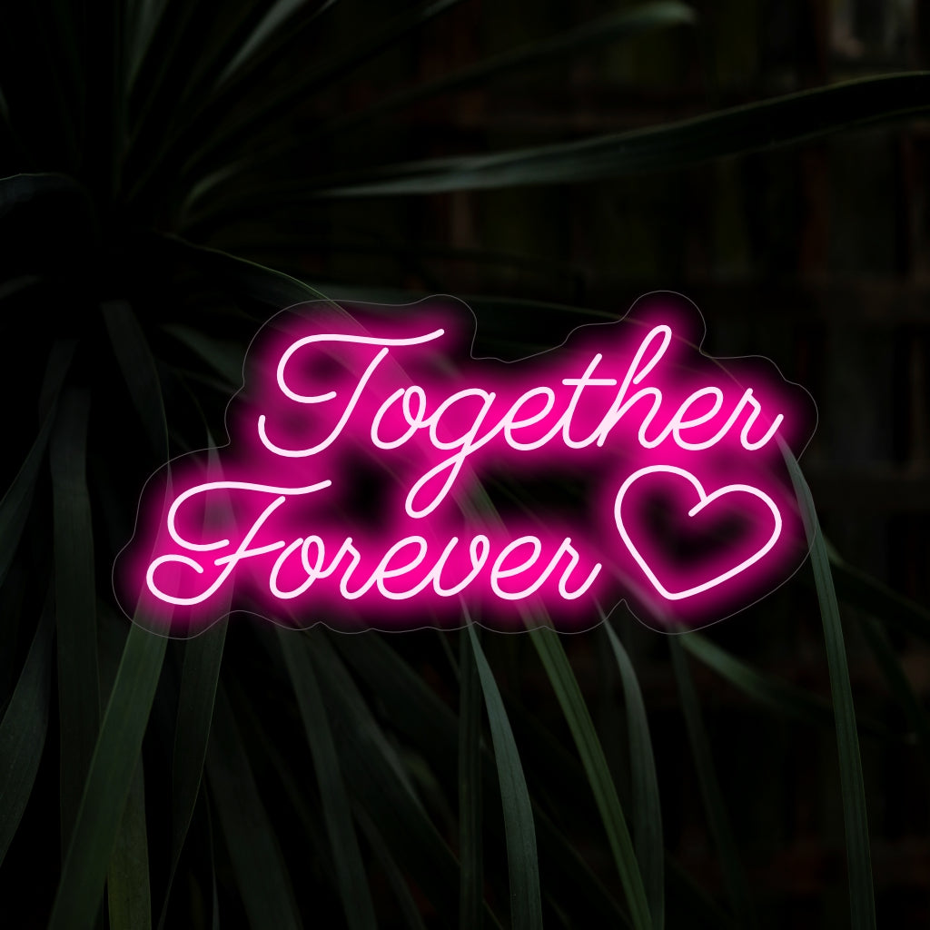 „Together Forever Neon Sign“ fängt mit seiner zeitlosen Botschaft Romantik ein und verbreitet einen sanften Schein, der die ewige Verbindung zweier Herzen in Ihrem Raum symbolisiert.