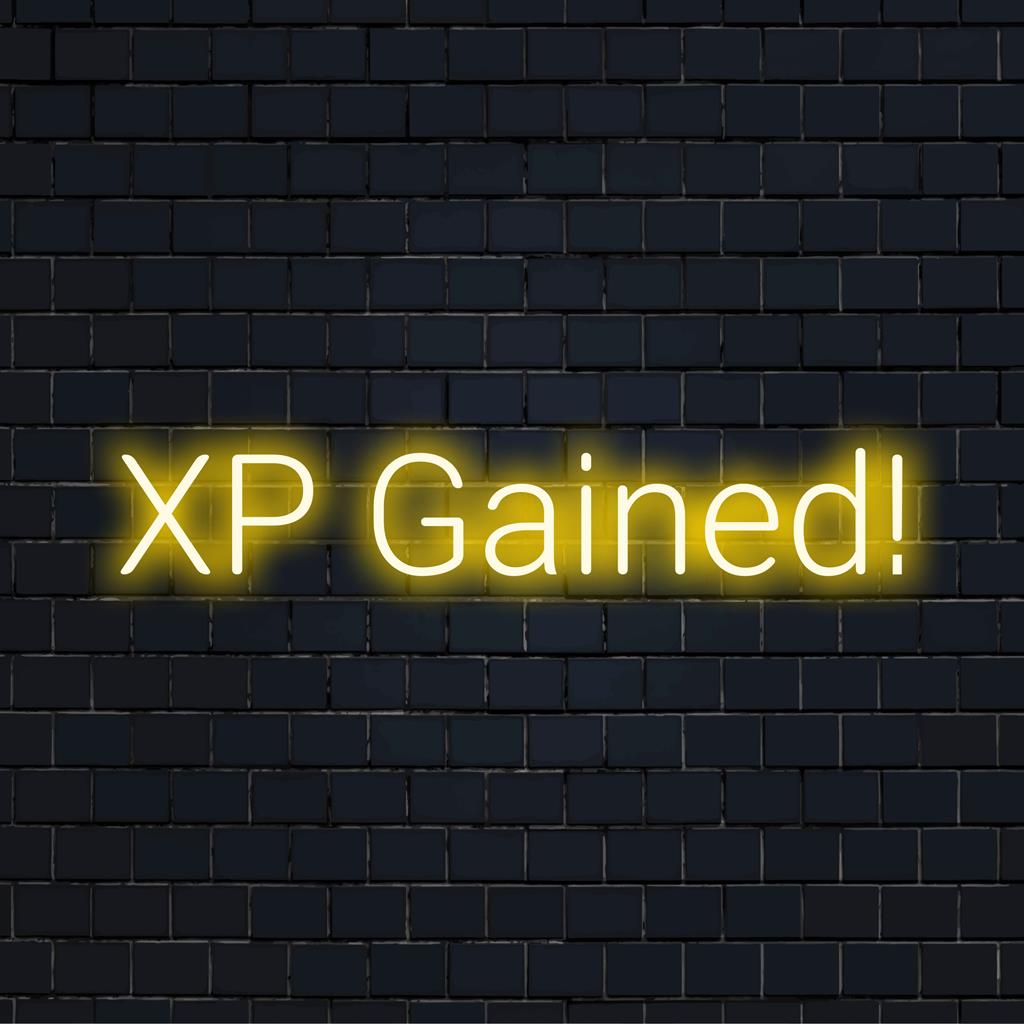 Individuelles LED-Neonschild mit der Aufschrift „XP Gained!“ in leuchtenden Farben; perfekte Dekoration für Gamer-Bereiche und moderne Innenräume.