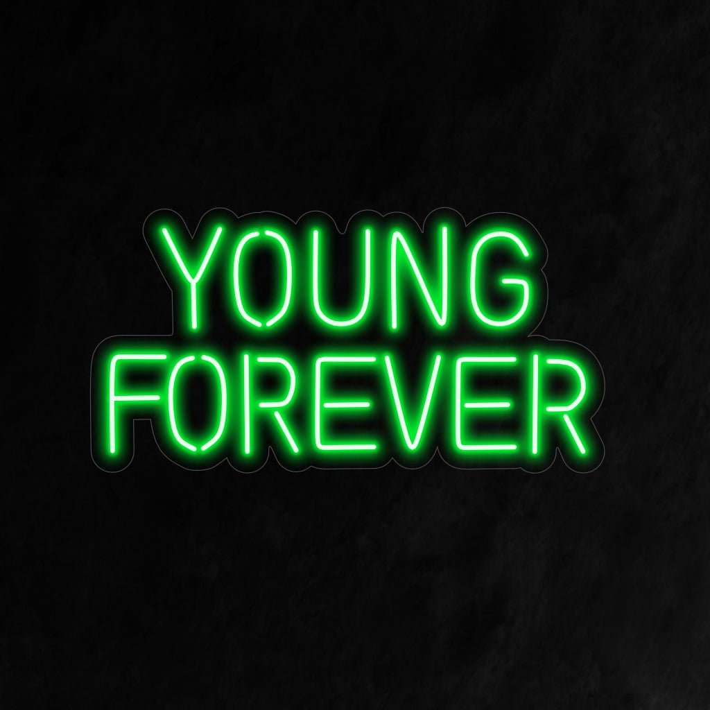 „Young Forever Neon Sign“ strahlt ein lebendiges und unbeschwertes Leuchten aus und schafft eine Atmosphäre, die die Freude und den Geist des ewigen Jungbleibens in Ihrem Raum feiert.