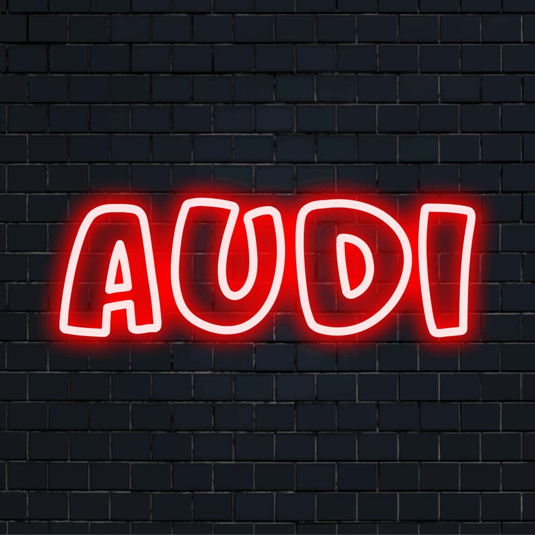 Audi LED Neon Sign, glowing lettering against brick backdrop