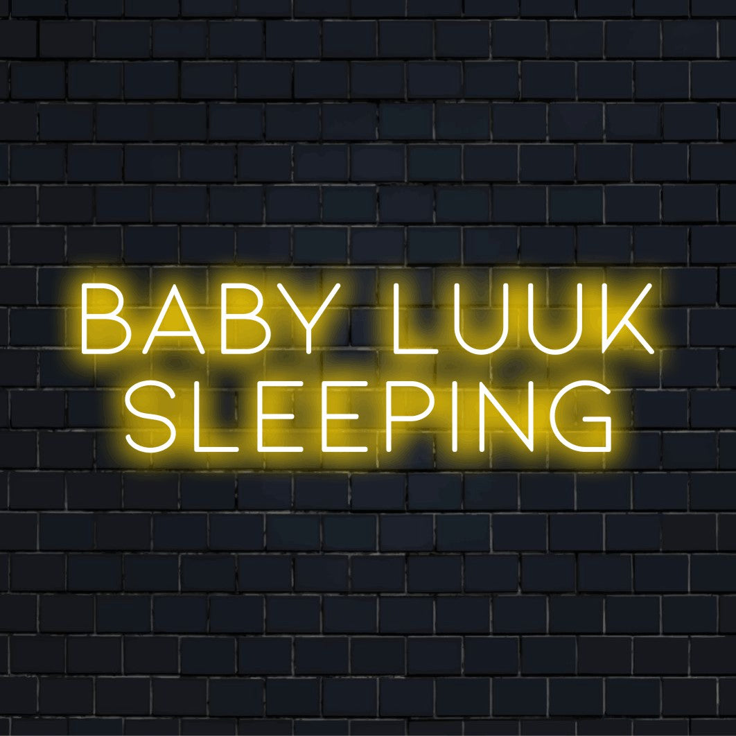 Baby Luuk Sleeping Custom Name Neon Sign, soft neon glow on black brick background