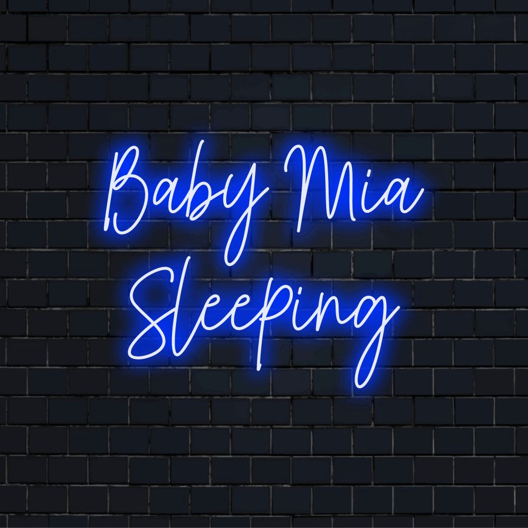 Baby Mia Sleeping Custom Name Neon Sign, neon text light on black brick background