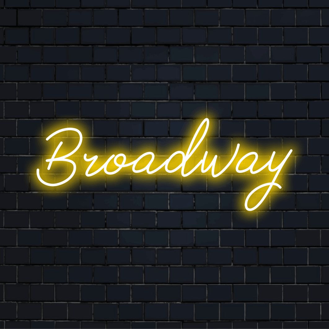 Broadway Neon Sign, glowing wall decor on black brick background