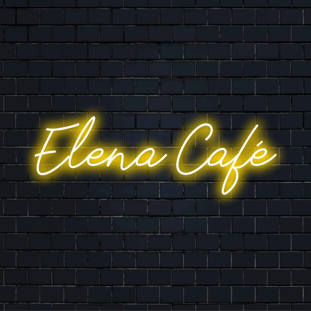 Elena Cafe Personalized Neon Light with soft neon glow on dark brick wall
