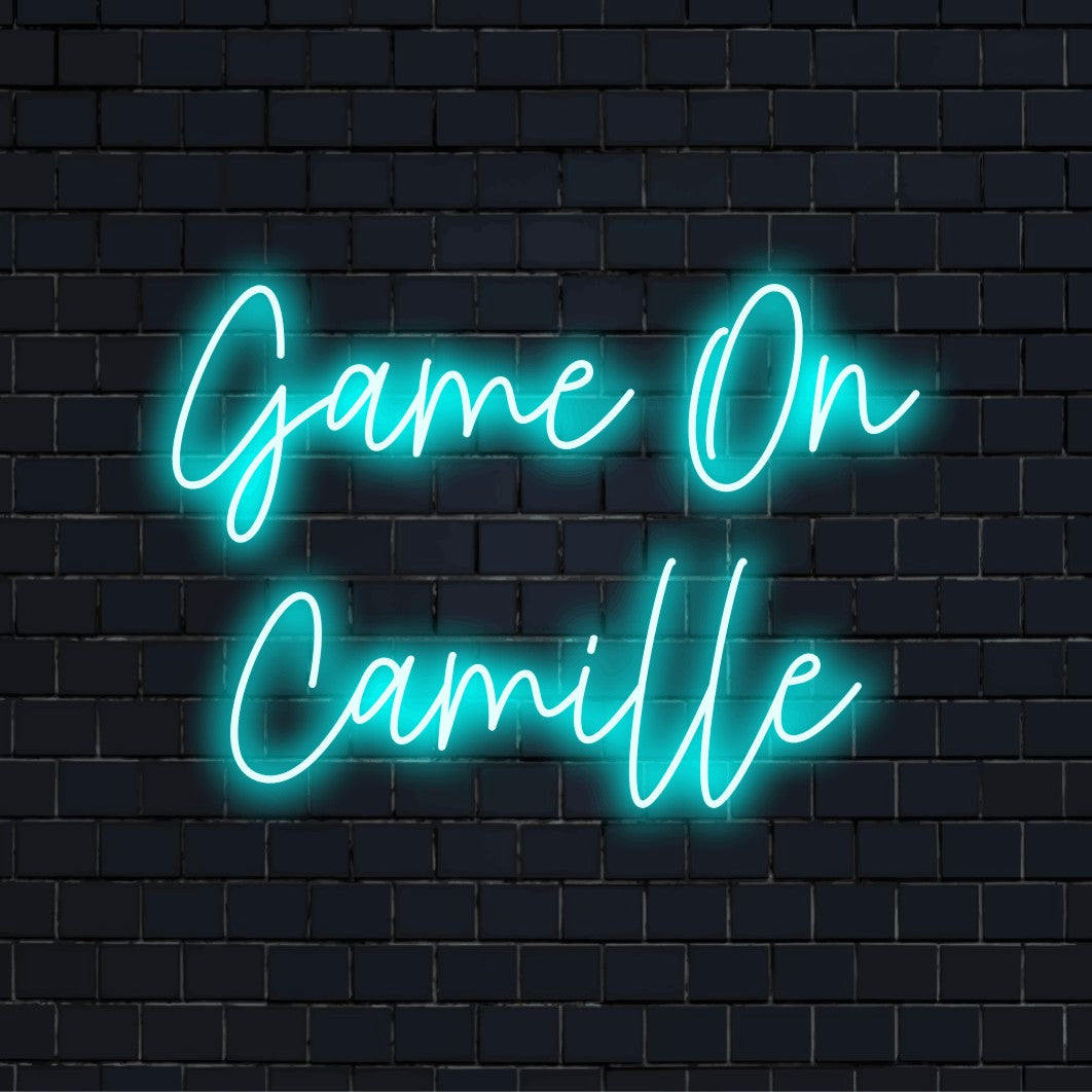 Game On Camille Custom Name Neon Sign, soft neon glow against brick backdrop