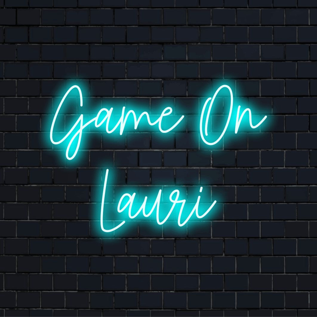Game On Lauri Personalized LED Neon Sign, glowing neon text on black brick background