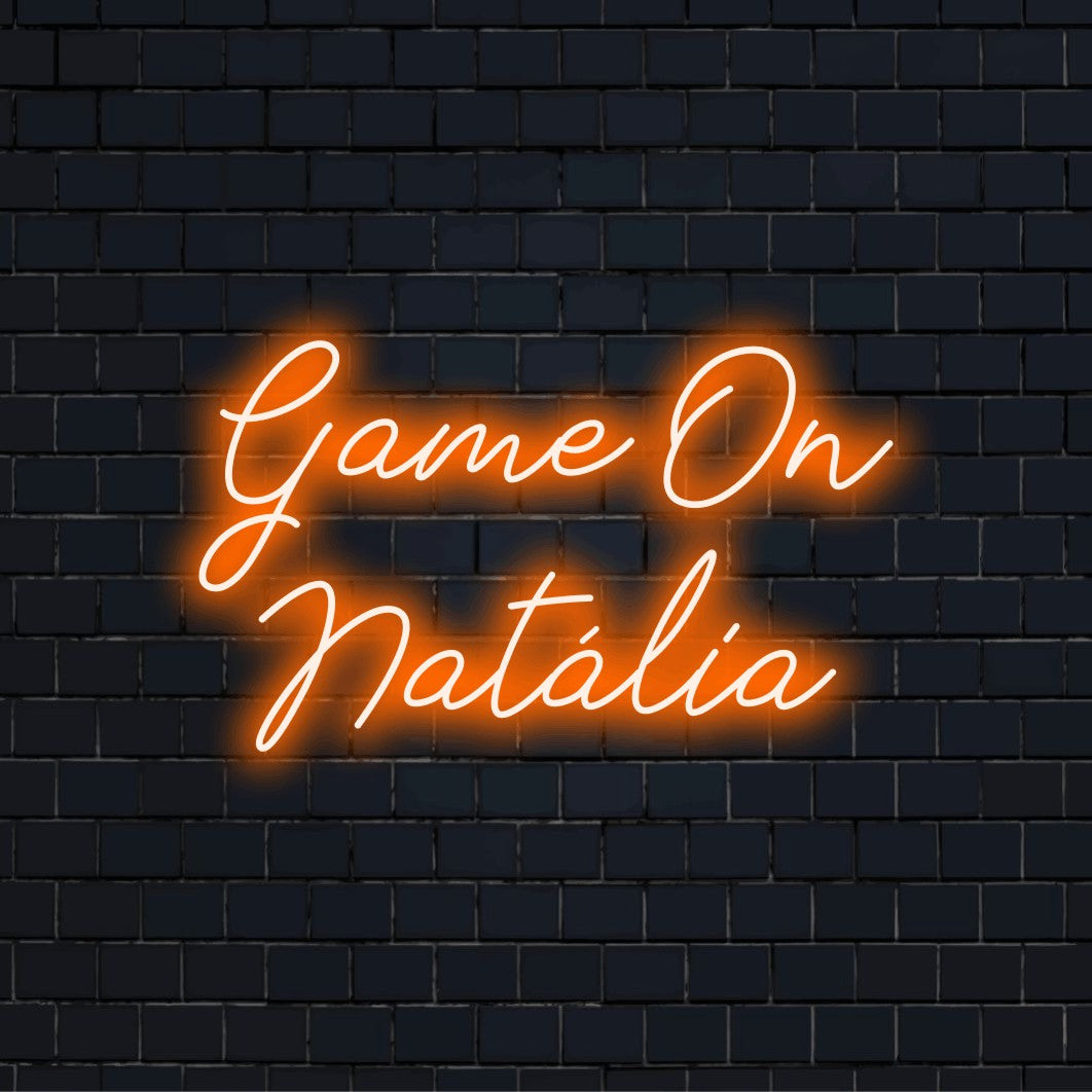 Game On Natalia Personalized LED Neon Sign, soft neon glow on dark brick wall