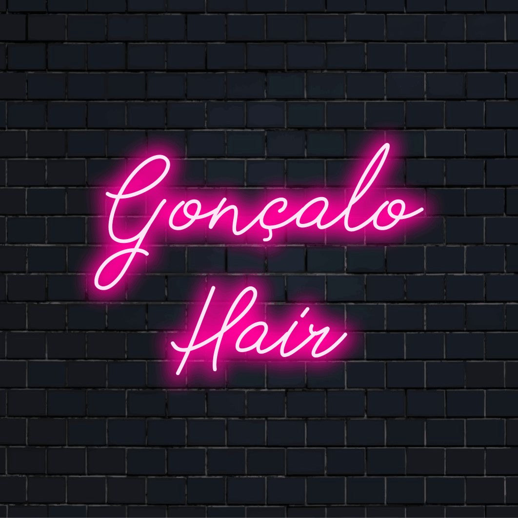 Goncalo Hair Custom Name Neon Sign, glowing wall decor against brick backdrop