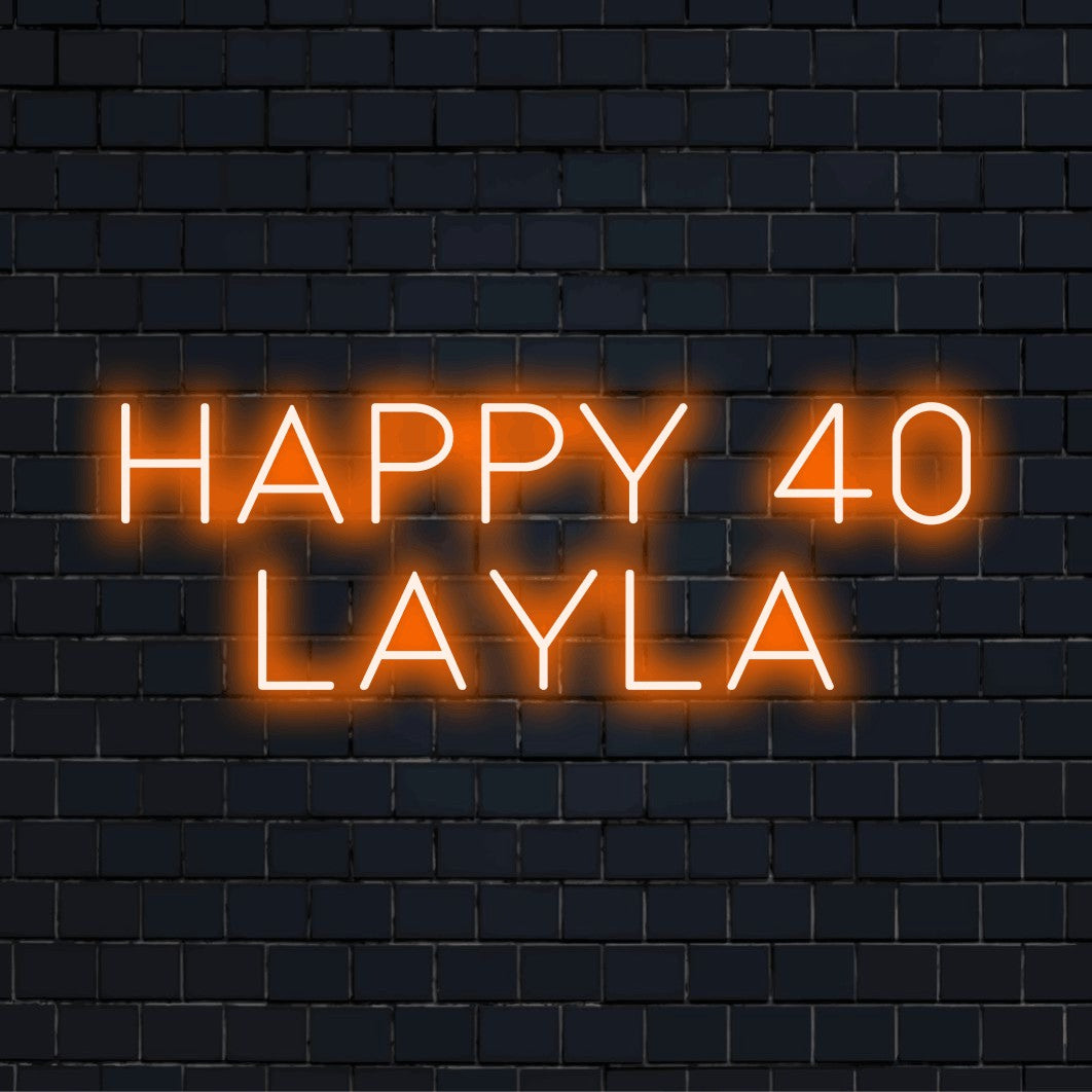 Happy 40 Layla Personalized LED Neon Sign, bright neon glow against brick backdrop