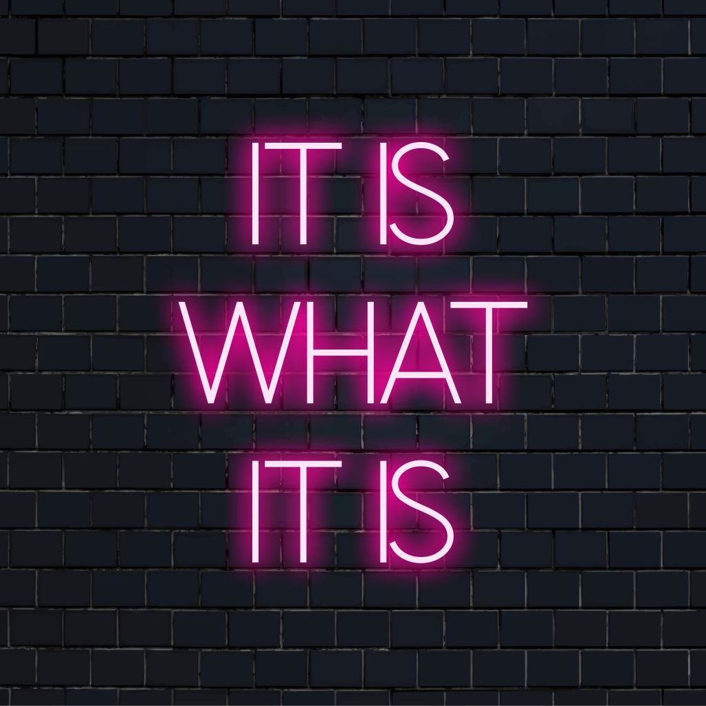 It Is What It Is Neon Sign, neon text light against brick backdrop