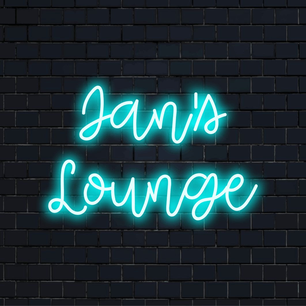 Jan_s Lounge Custom Name Neon Sign, glowing lettering against black brick wall