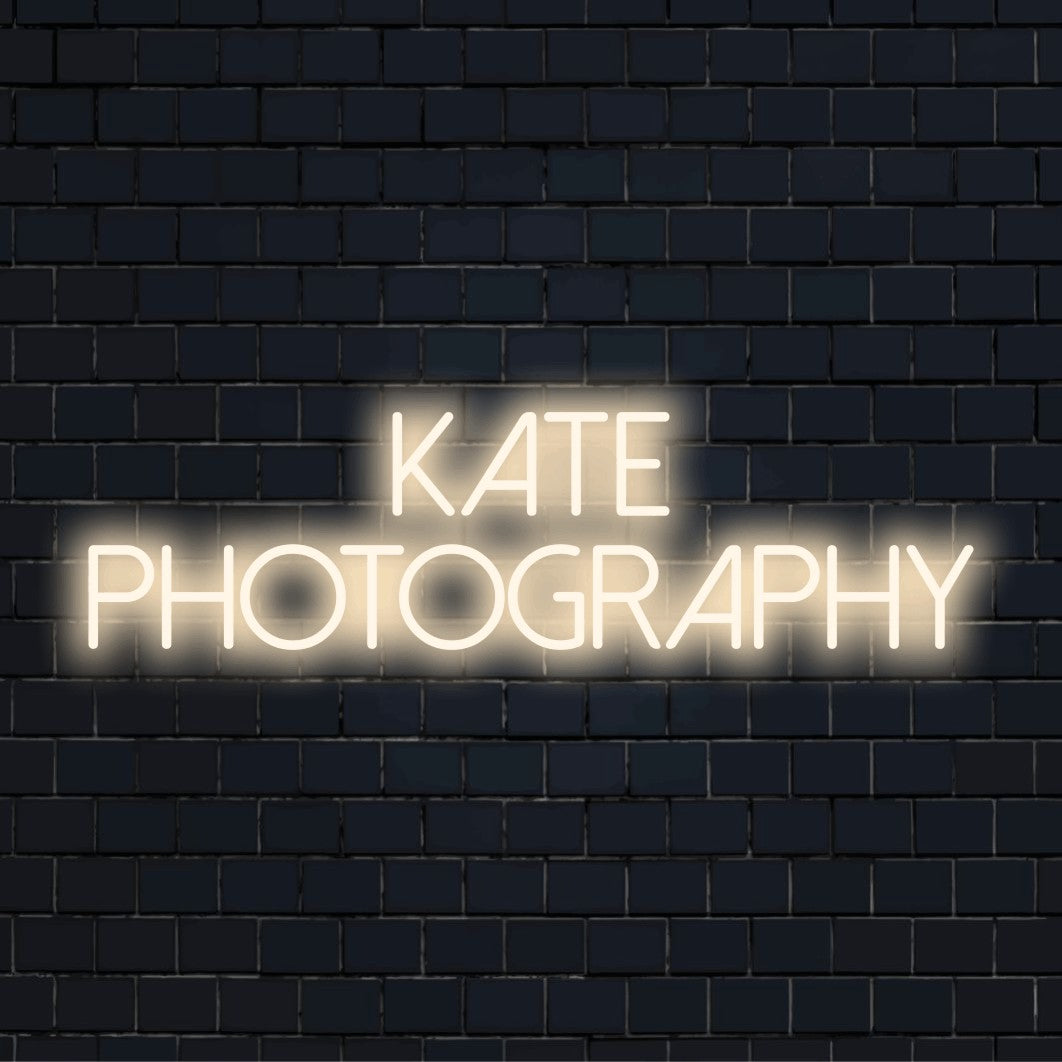 Kate Photography Custom Name Neon Sign, bright neon lettering against brick backdrop