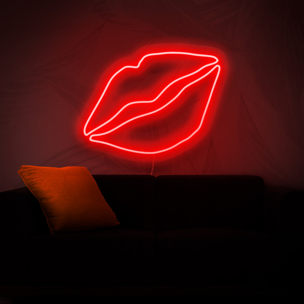 Ein Neonschild mit auffälligen Lippen, das mit seinem lebendigen und fesselnden Licht jedem Raum einen Hauch von Schönheit und Glamour verleiht.