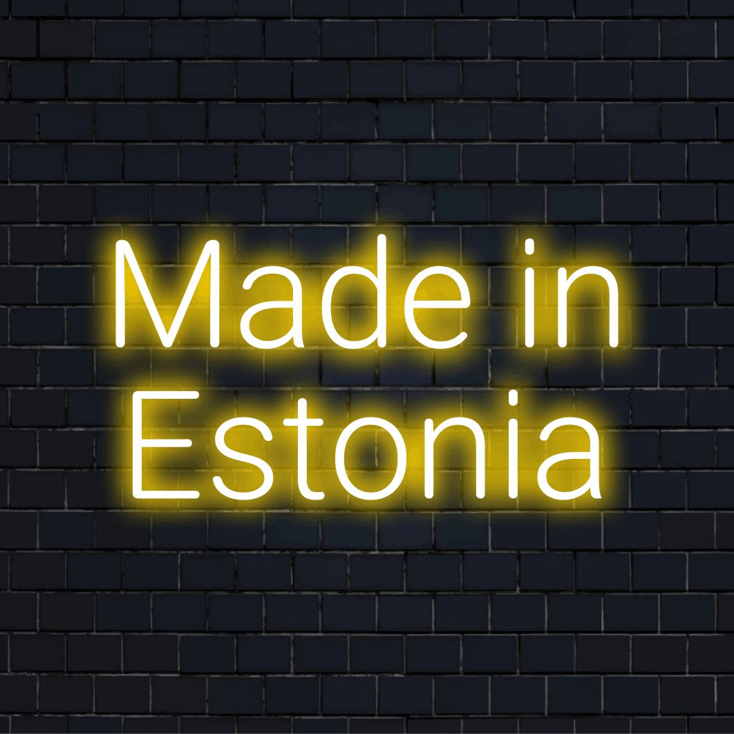 Made In Estonia Neon Light with glowing lettering on dark brick background