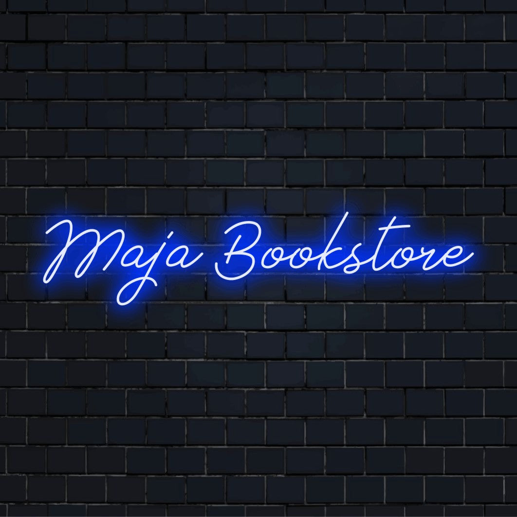 Maja Bookstore Custom Name Neon Sign, glowing neon text on dark brick background