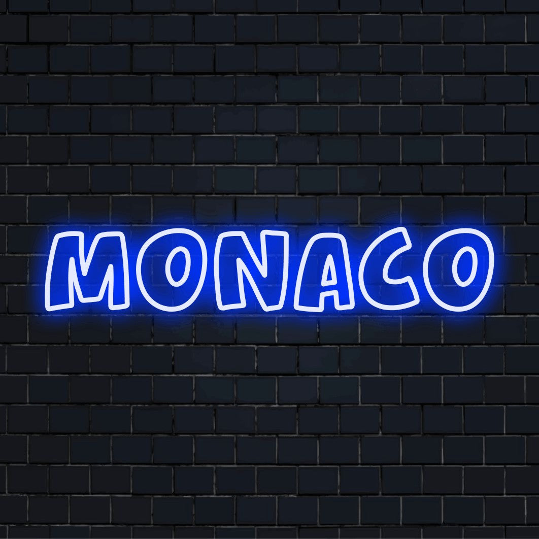 Monaco Neon Light with neon text light on black brick background