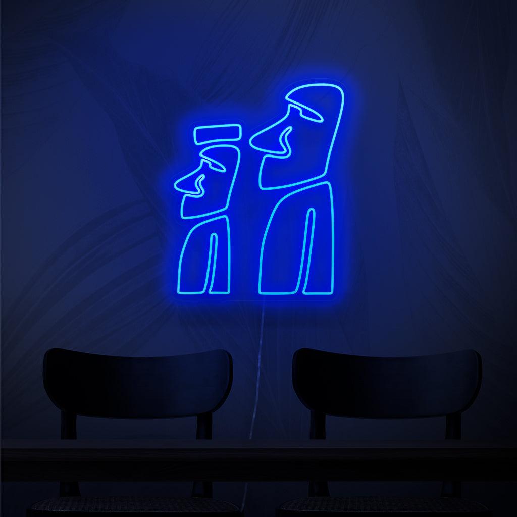 Ein bezauberndes Neonschild mit den Monumenten der Moai, ikonischen Steinstatuen von der Osterinsel.