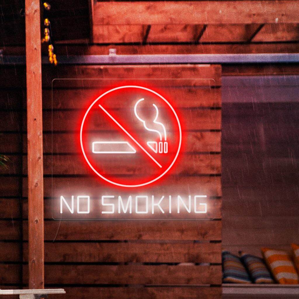 Ein auffälliges Neonschild mit einem Verbotssymbol und einer brennenden Zigarette darin sowie den Worten „Rauchen verboten“.