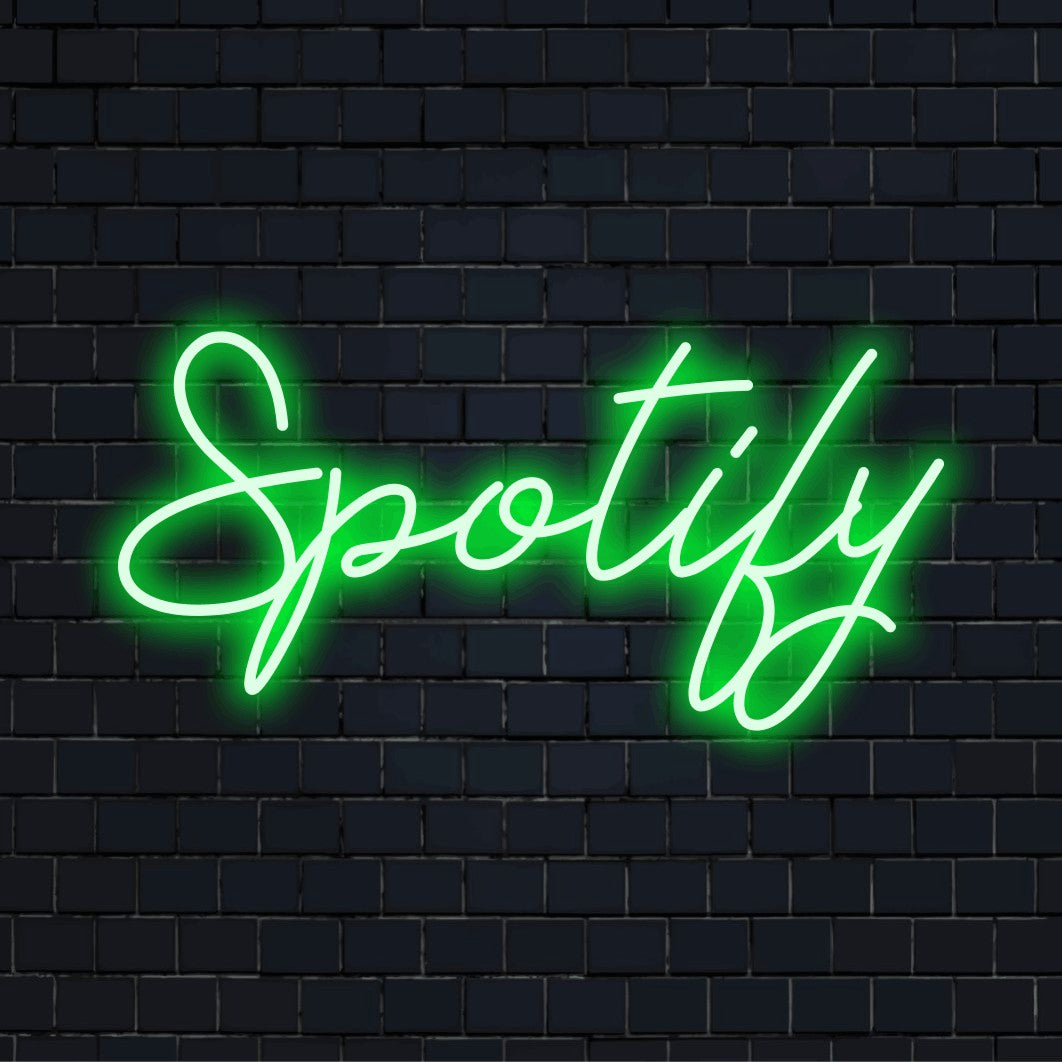 Spotify Neon Light with glowing wall decor on dark brick wall
